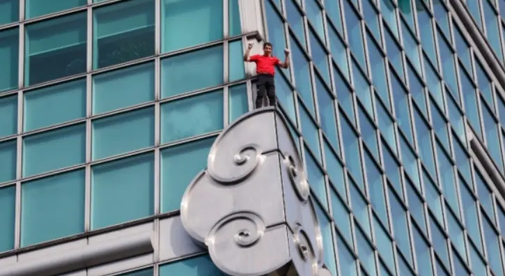 創紀錄！美國徒手攀岩運動員91分鐘登頂台北101 