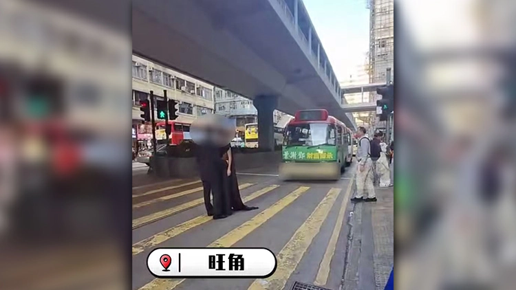 有片｜旺角一對男女站馬路中央拍照 驚險萬分