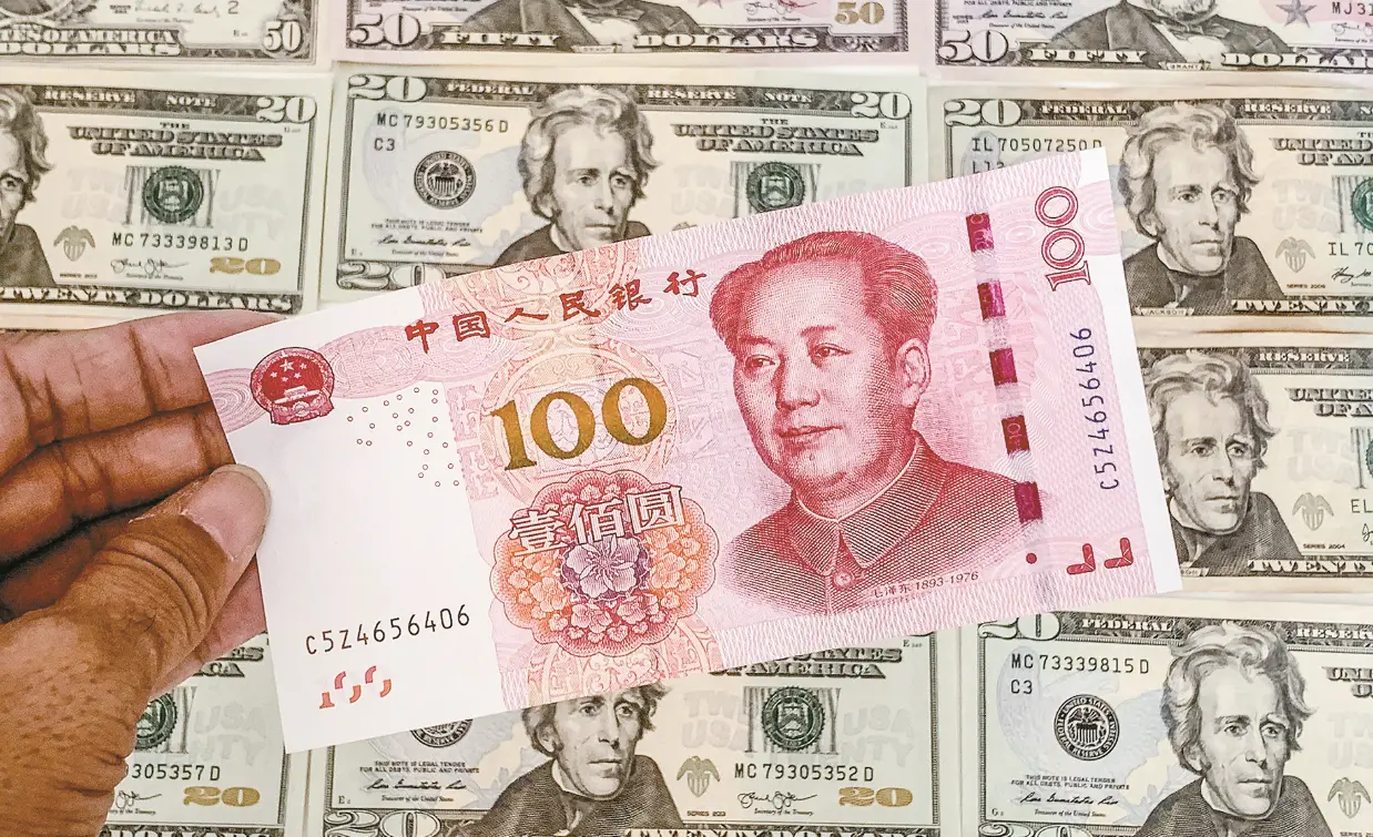 人民幣兌美元升越6.9算 外資流入港股A股規模料超去年