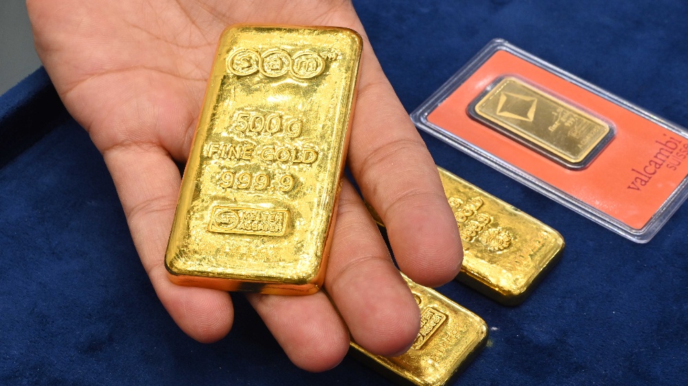 金價自兩周高點回落 A股港股黃金股紛紛下挫