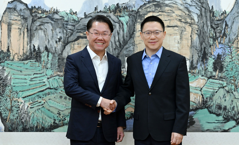 財政部副部長廖岷會見新加坡金融管理局副行長梁新松