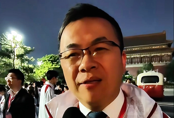 有片丨帶少年升旗隊訪京觀禮 總監伍煥杰囑早睡早起 全團精神奕奕
