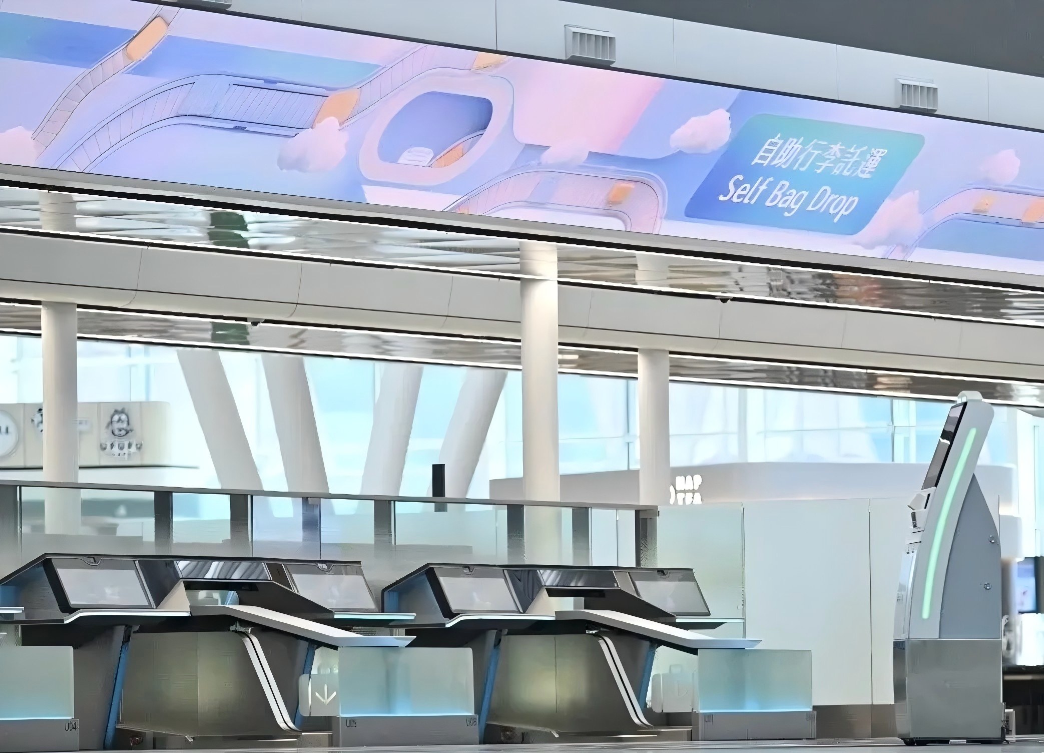 圖說三:T2航站樓的68個自助行李託運櫃枱採用「One Touch」技術.jpg